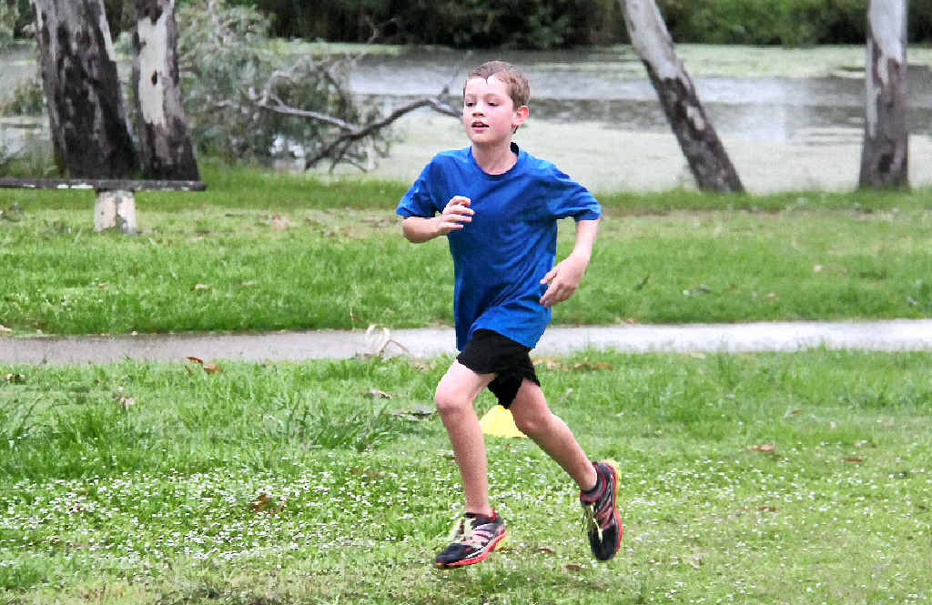 Youngster Lachlan McPhee aims for a personal-best time at park run on Saturday.